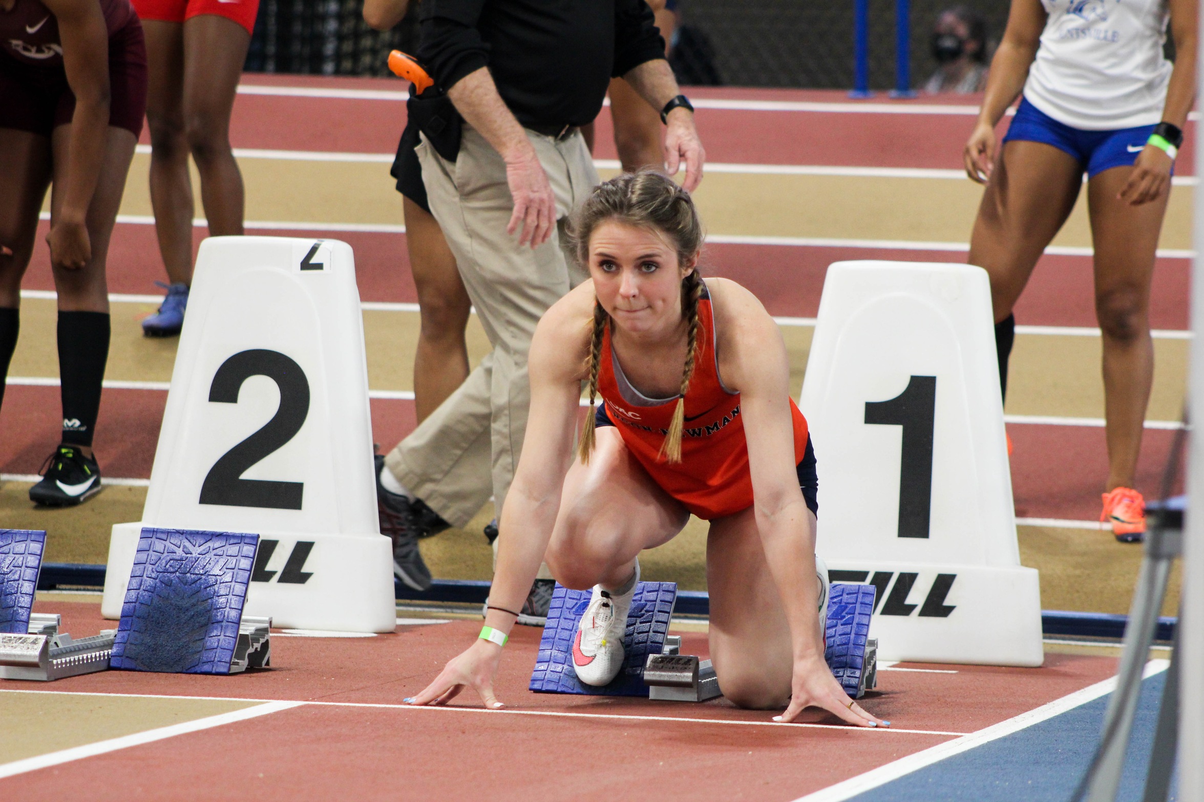Moore Sets Two Qualifying Times While Lowe Breaks School Record at Buccaneer Invitational