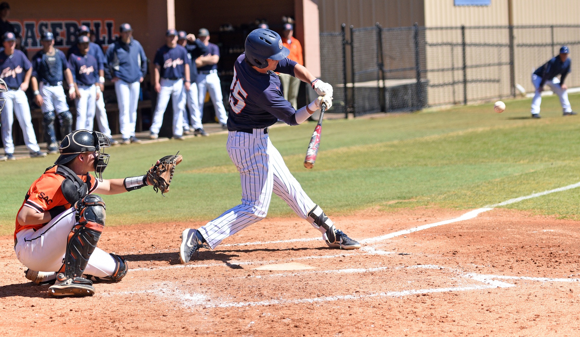 Bats bust outs as Eagles split with No. 9 Wolves