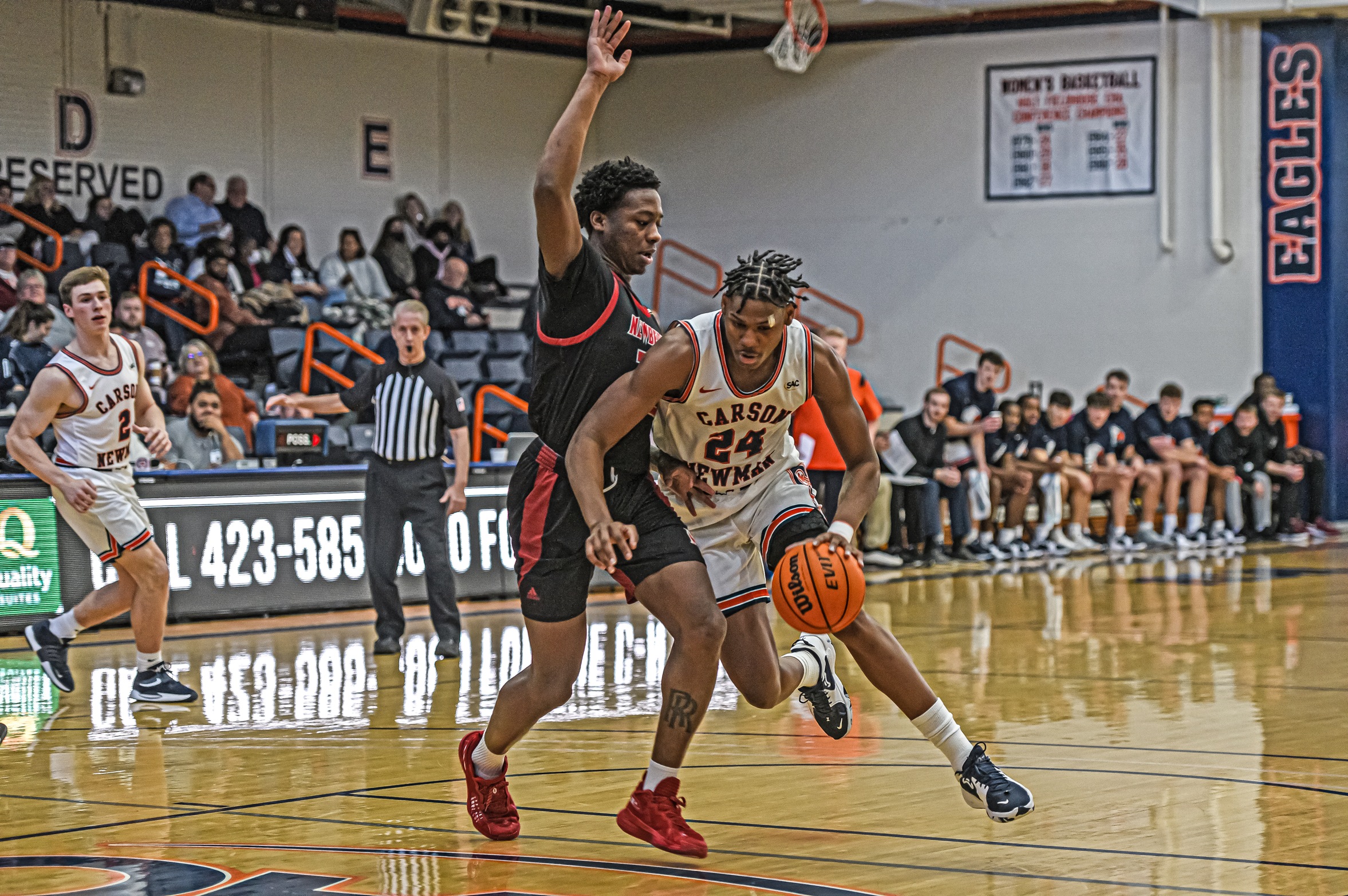 Eagles take Wolves to block party, prevail in defensive slobber knocker 55-47