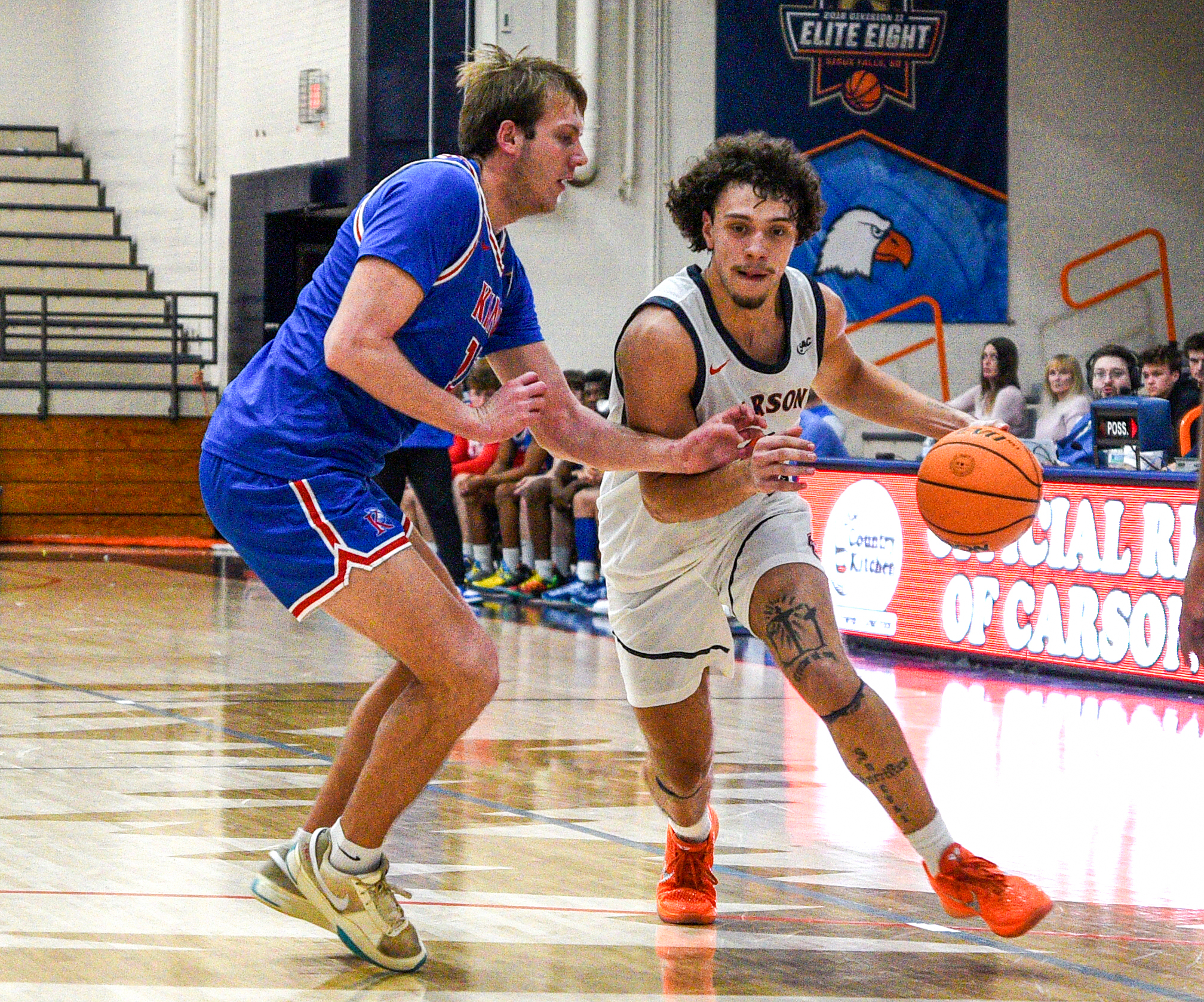 Benson, Carter collide as C-N heads to Mars Hill