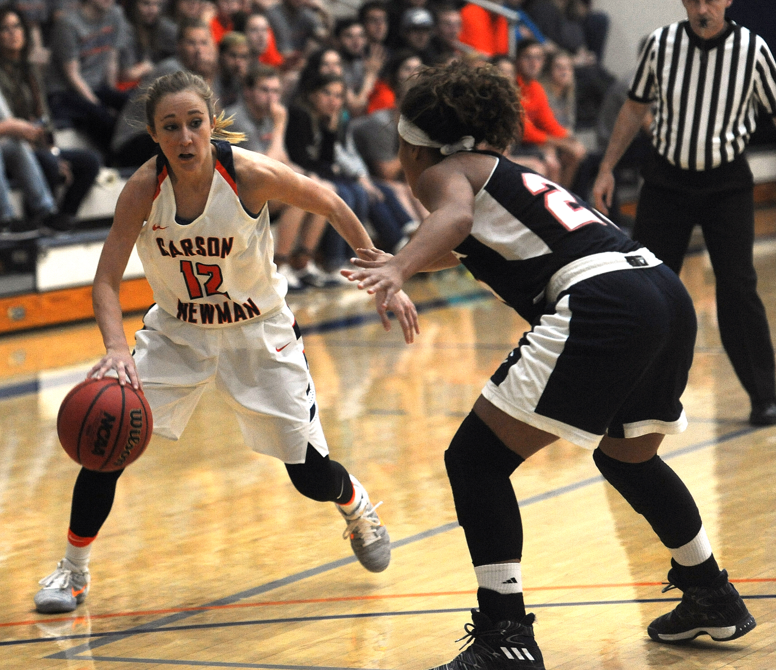 Lady Eagles grind out 10-point win over Pioneers