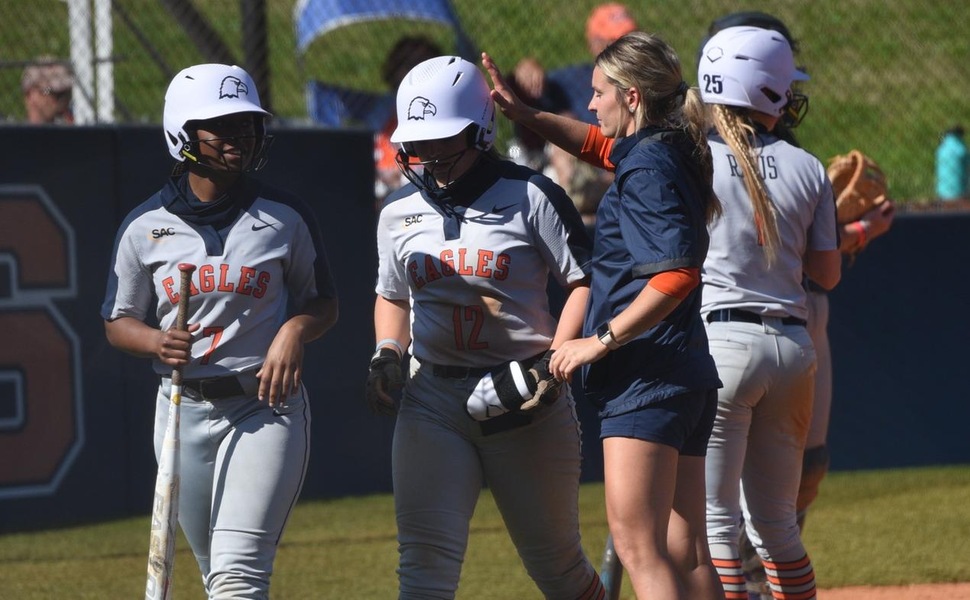 Macey Hughes celebrates a home run against Catawba.